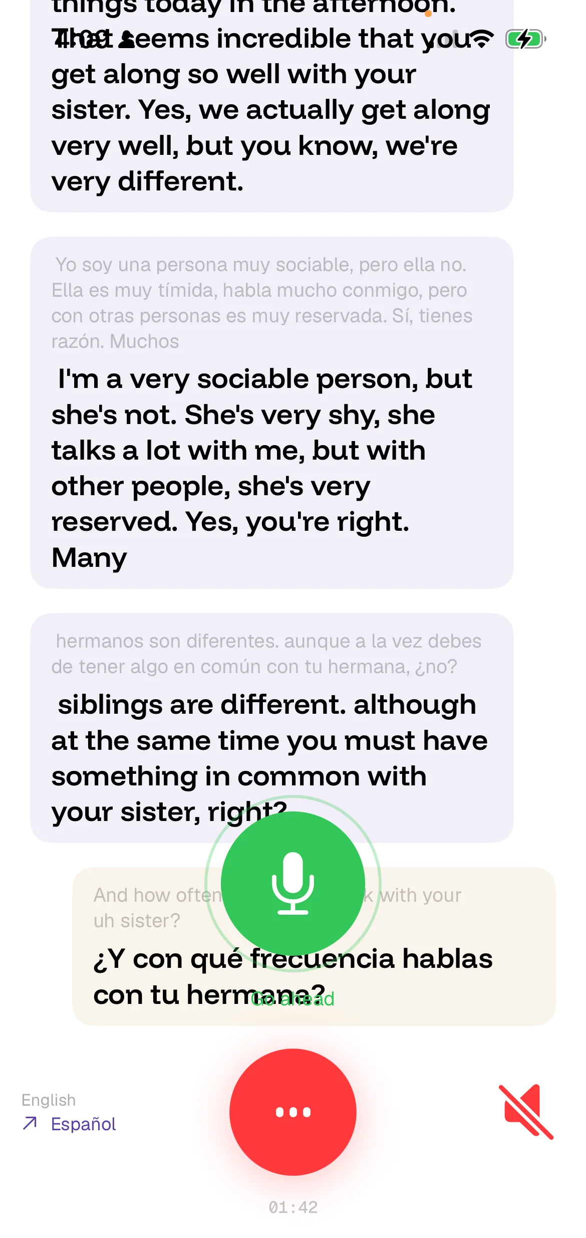 The speak page after the swipe, with the microphone button live and the reply about to be spoken in Spanish.